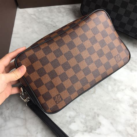 lv bag clutch|Lv clutch bags men's.